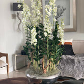 Allee-Pflanzgefäß mit Dendrobium-Orchideen